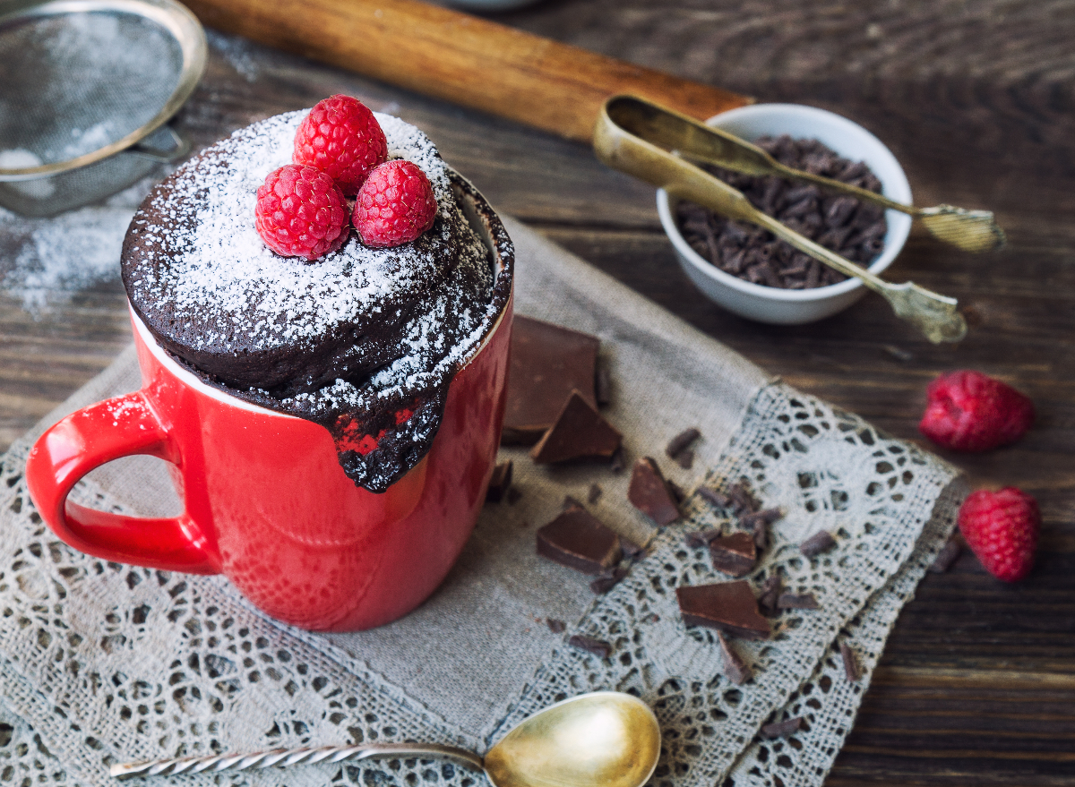 chocolate mug cake with raspberries, healthy dessert swaps concept