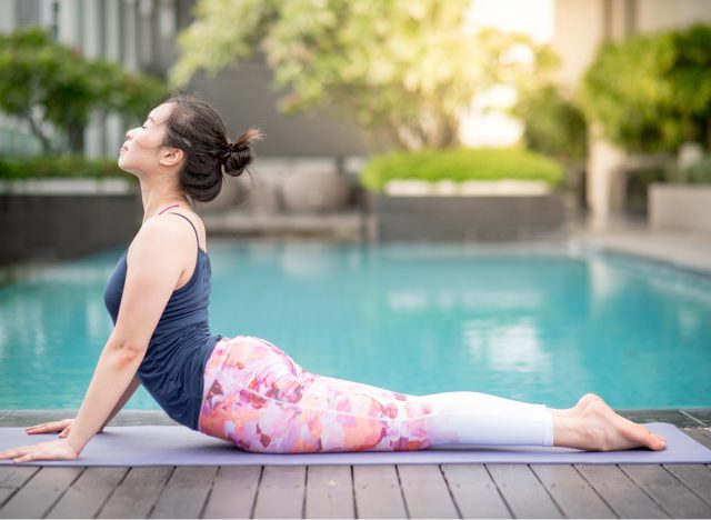 woman doing cobra yoga pose