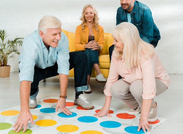 couples playing Twister game