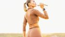 fitness woman drinking water on morning walk, demonstrating how to lose weight before breakfast