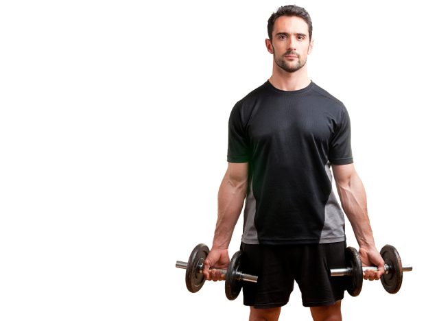 man standing with dumbbells to perform exercises for bigger arms