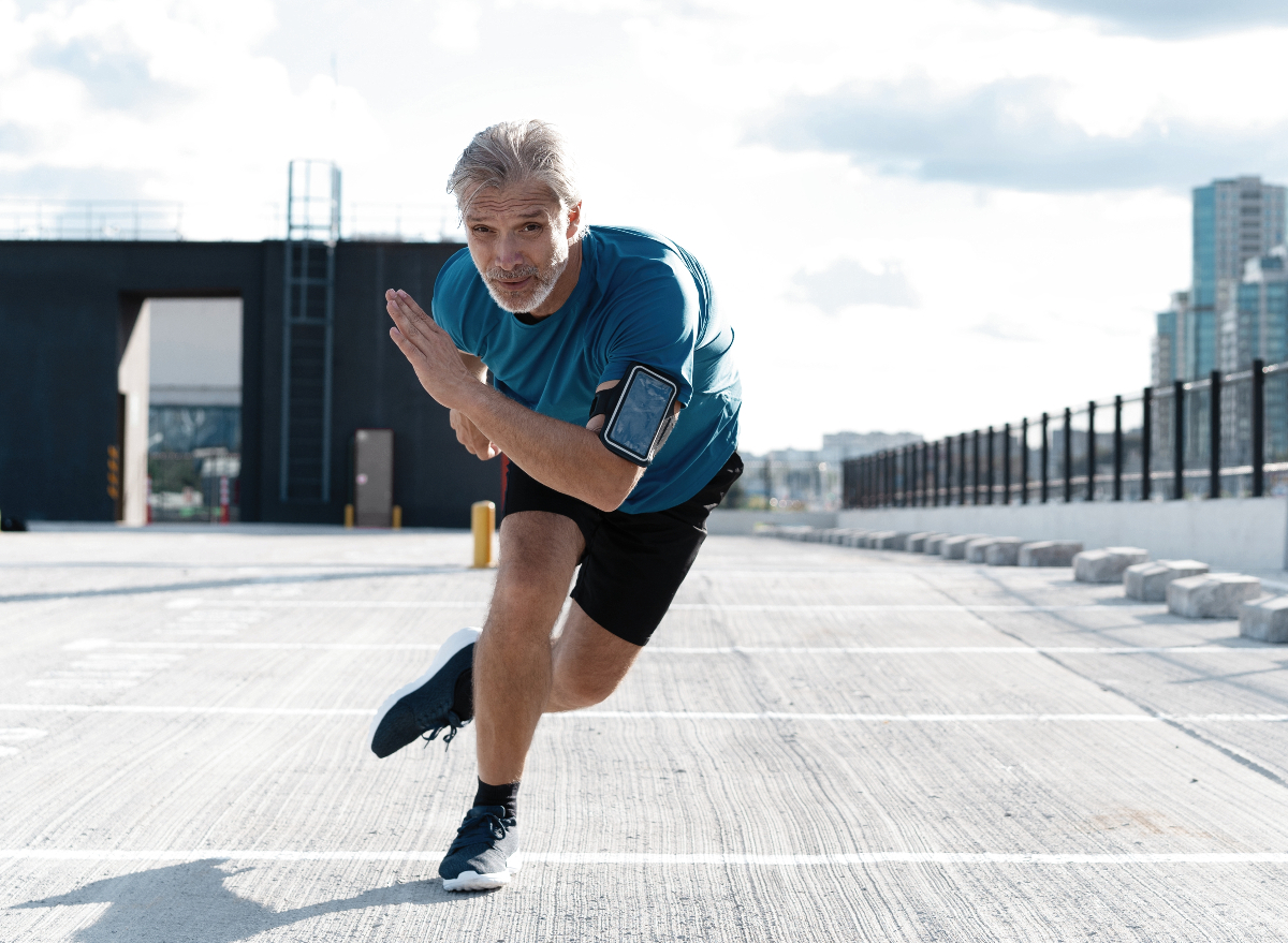 mature man demonstrating intense outdoor workout to get rid of your pot belly