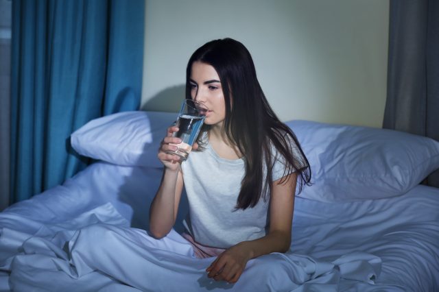 Drinking water at night in bed