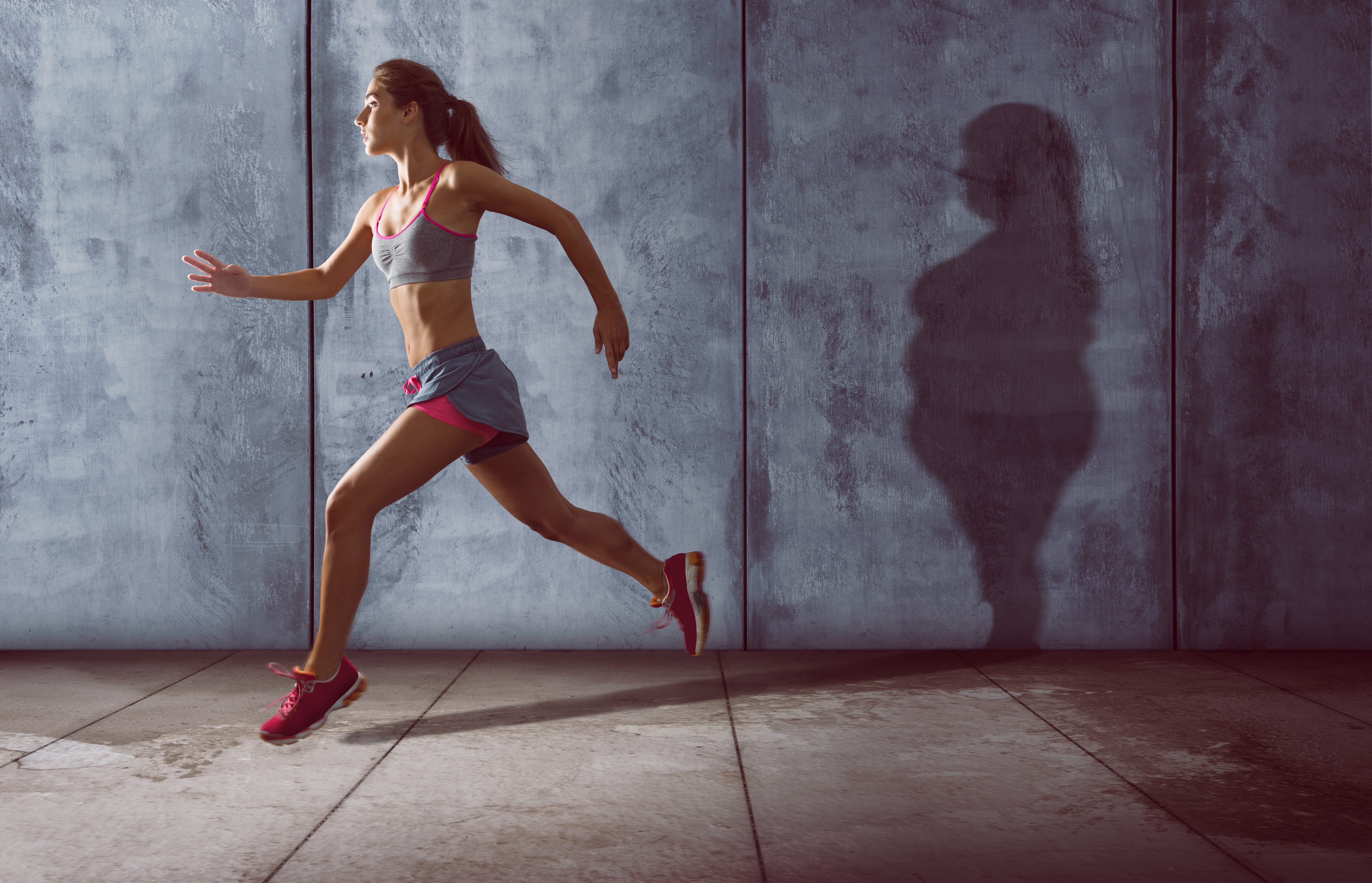 fatphobia woman-running with an overweight shadow