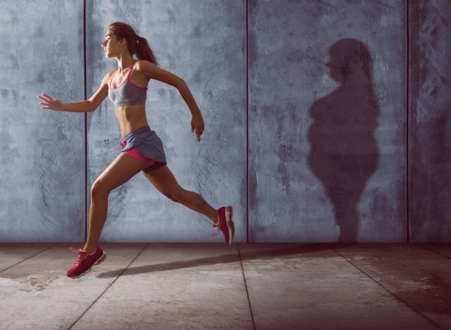 fatphobia woman-running with an overweight shadow