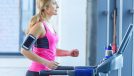 fit blonde woman doing treadmill incline walking workout