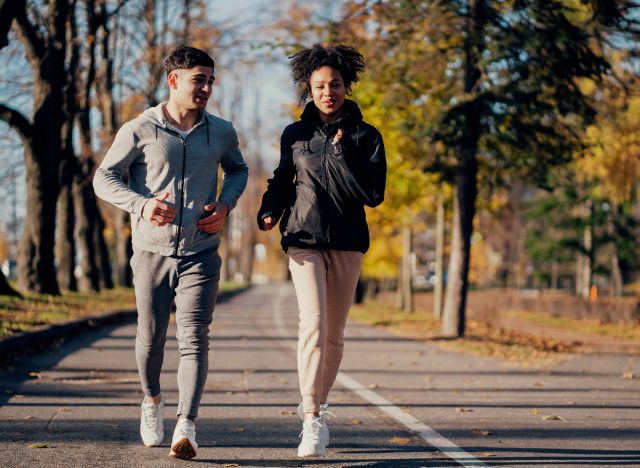 active couple running outside