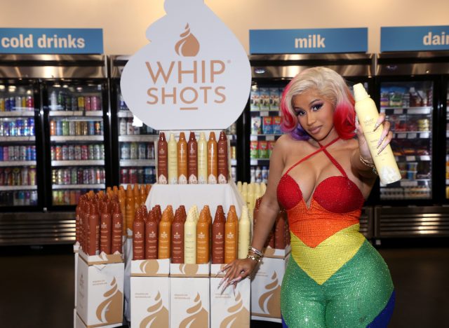 cardi b holding whipshots