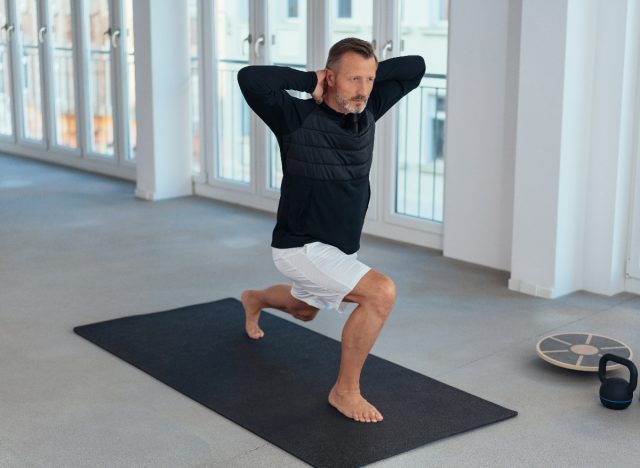 mature man doing lunges