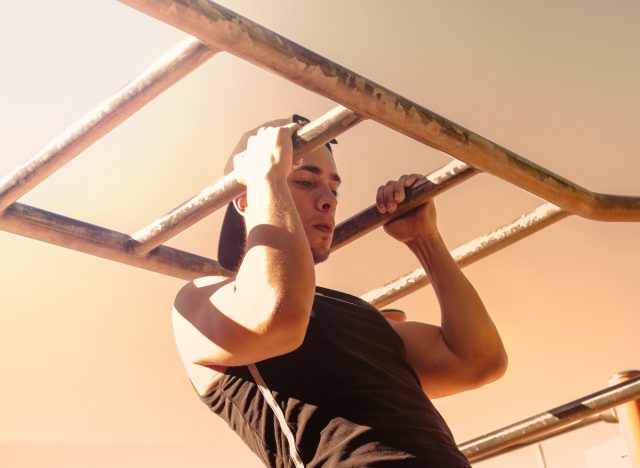 man performing parallel grip pull-ups