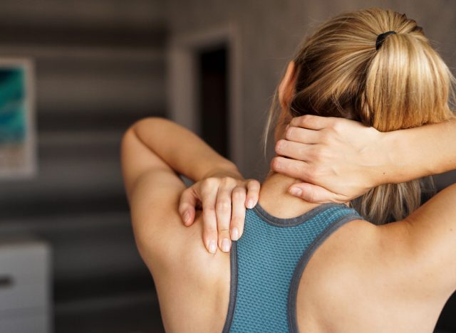 woman neck pain after working