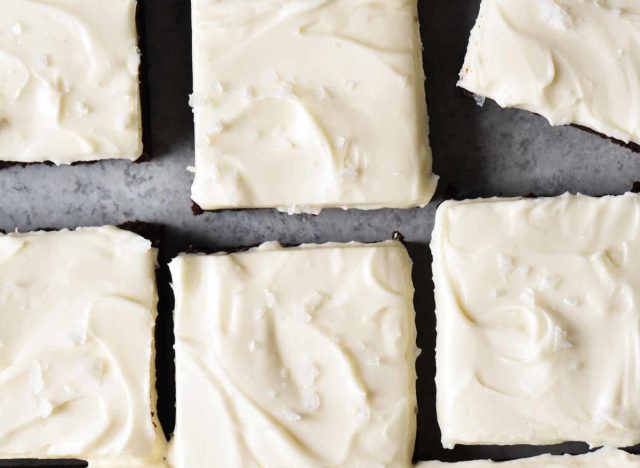 a pan of brownies with white frosting