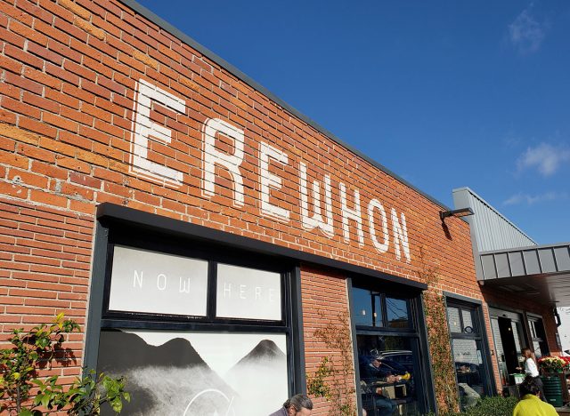 A store front sign for the upscale organic grocery store chain known as Erewhon.