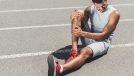 fit man dealing with leg injury on the track, concept of exercises habits that destroy your leg strength