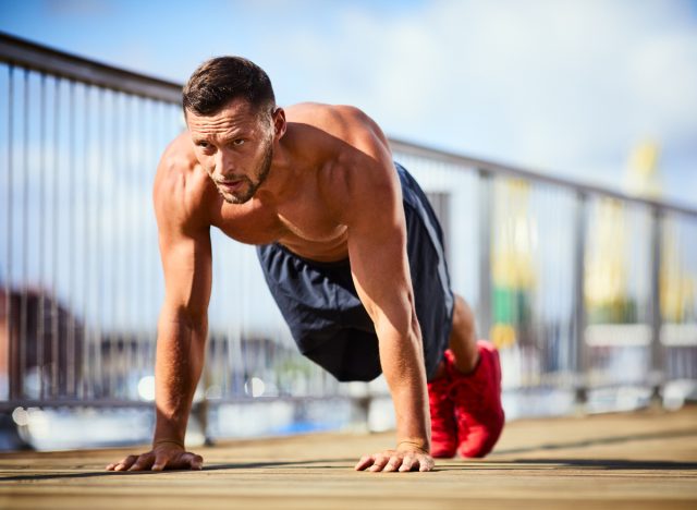 fit man doing pushups, exercises for men to lose belly fat