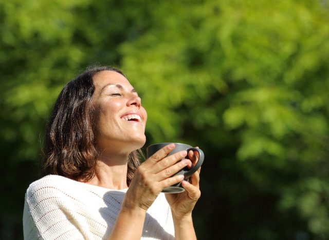 happy woman outdoors in the sunshine