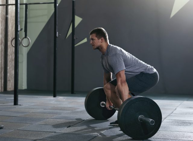 man doing barbell deadlift