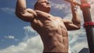 muscular man doing chin-ups outdoors to build size and strength