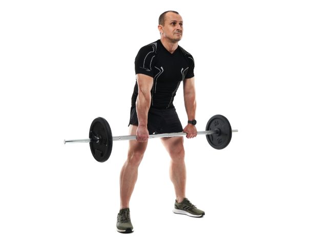 middle-aged man doing deadlift exercise
