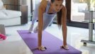 fit woman doing mountain climbers on mat, part of 10-minute indoor cardio workout