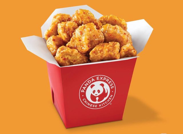 panda express orange chicken in a red container.