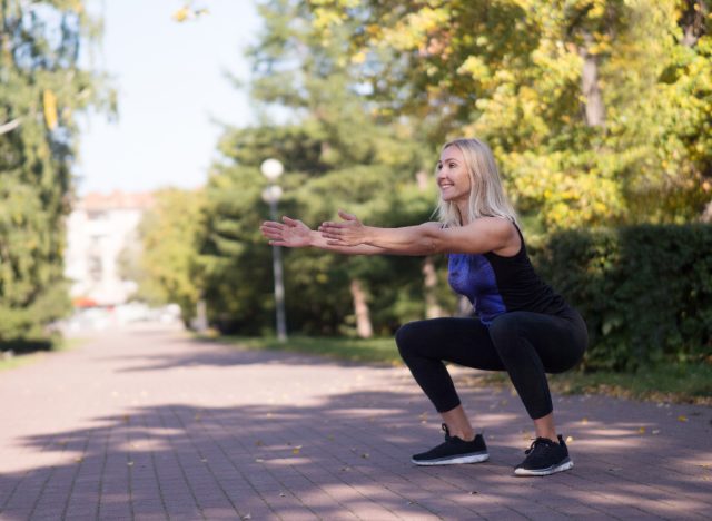 woman bodyweight squats