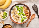 yogurt bowl with banana kiwi chia seeds and nuts