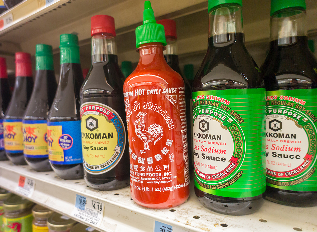 A bottle of Sriracha hot sauce at a supermarket