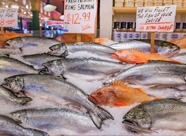 Fresh king salmon and snapper on ice for sale at the market