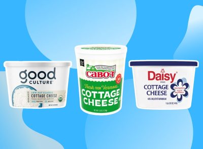 three cartons of cottage cheese on a blue background