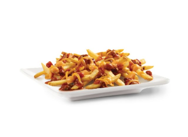 plate of Wendy's chili cheese fries on a white background