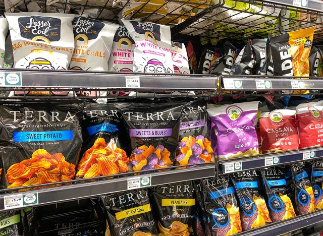 A display of Potato, Plantain, and Cassava Chips at a Whole Foods Market Grocery Store.