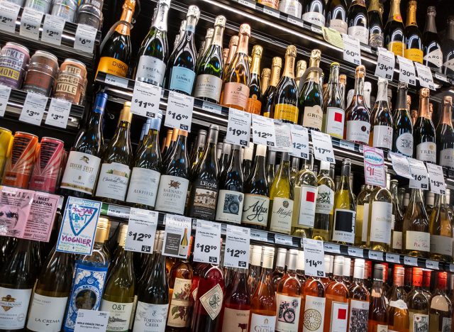 refrigerated wine inside a grocery store.