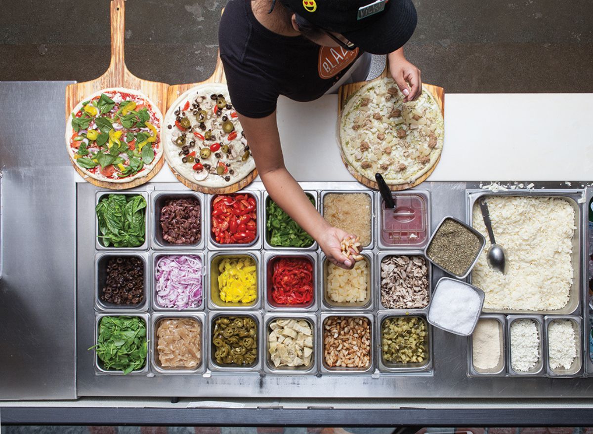 7 Pizza Chains With the Most Unique Toppings — Eat This Not That
