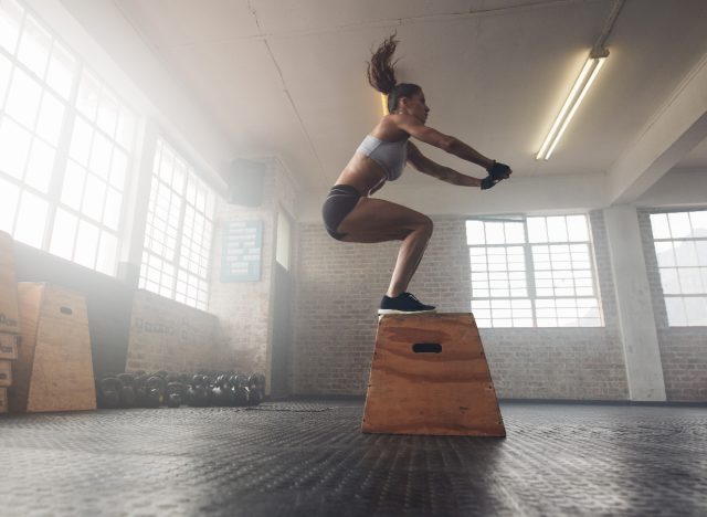 woman doing box jumps