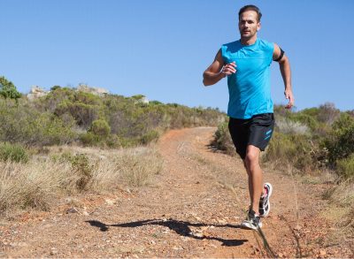 fit man trail running, concept of fitness habits that destroy body before 50