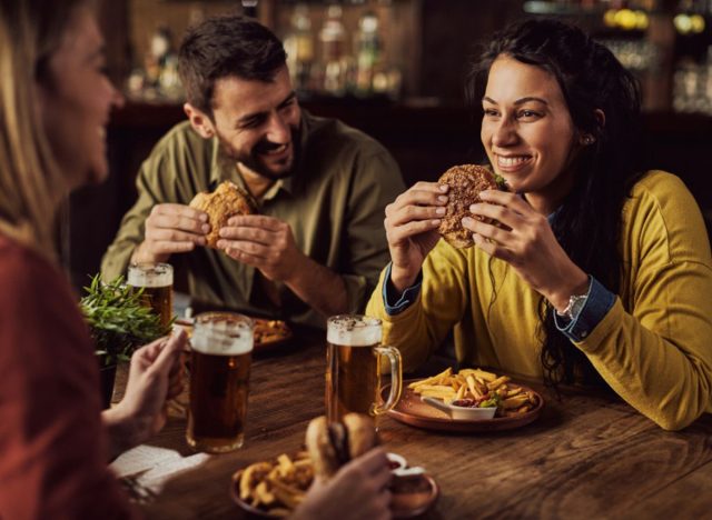 friends enjoying burgers