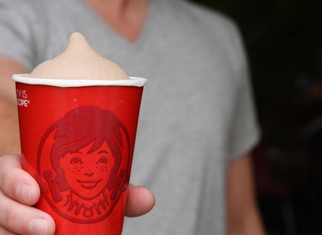 handing wendys frosty