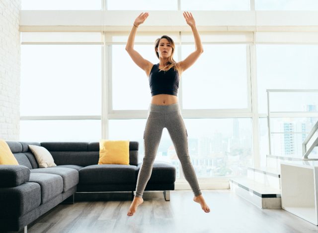 woman doing jump squats exercises for burning calories