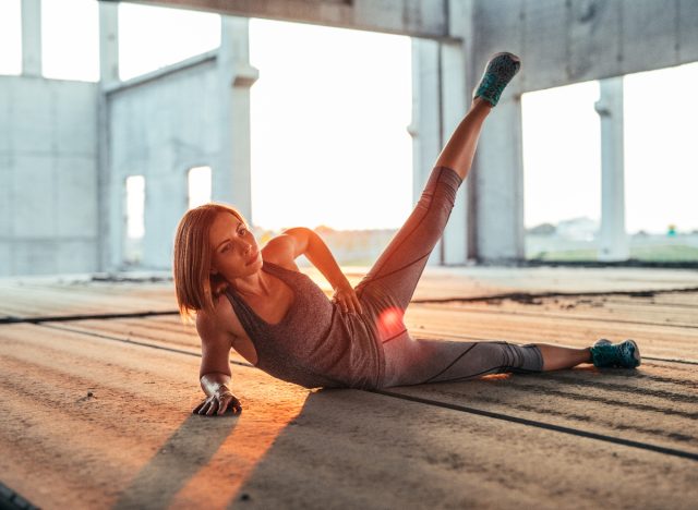 fitness woman doing leg raises
