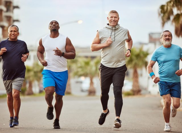 senior fitness group running outdoors