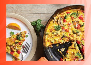 photo of vegetable frittata on red background