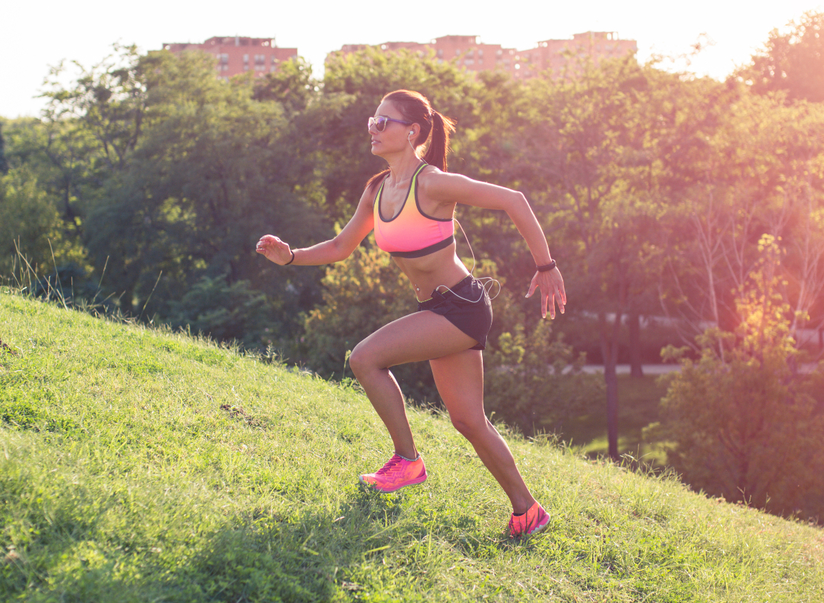 woman doing hill runs, concept of 10-minute incline workout for weight loss