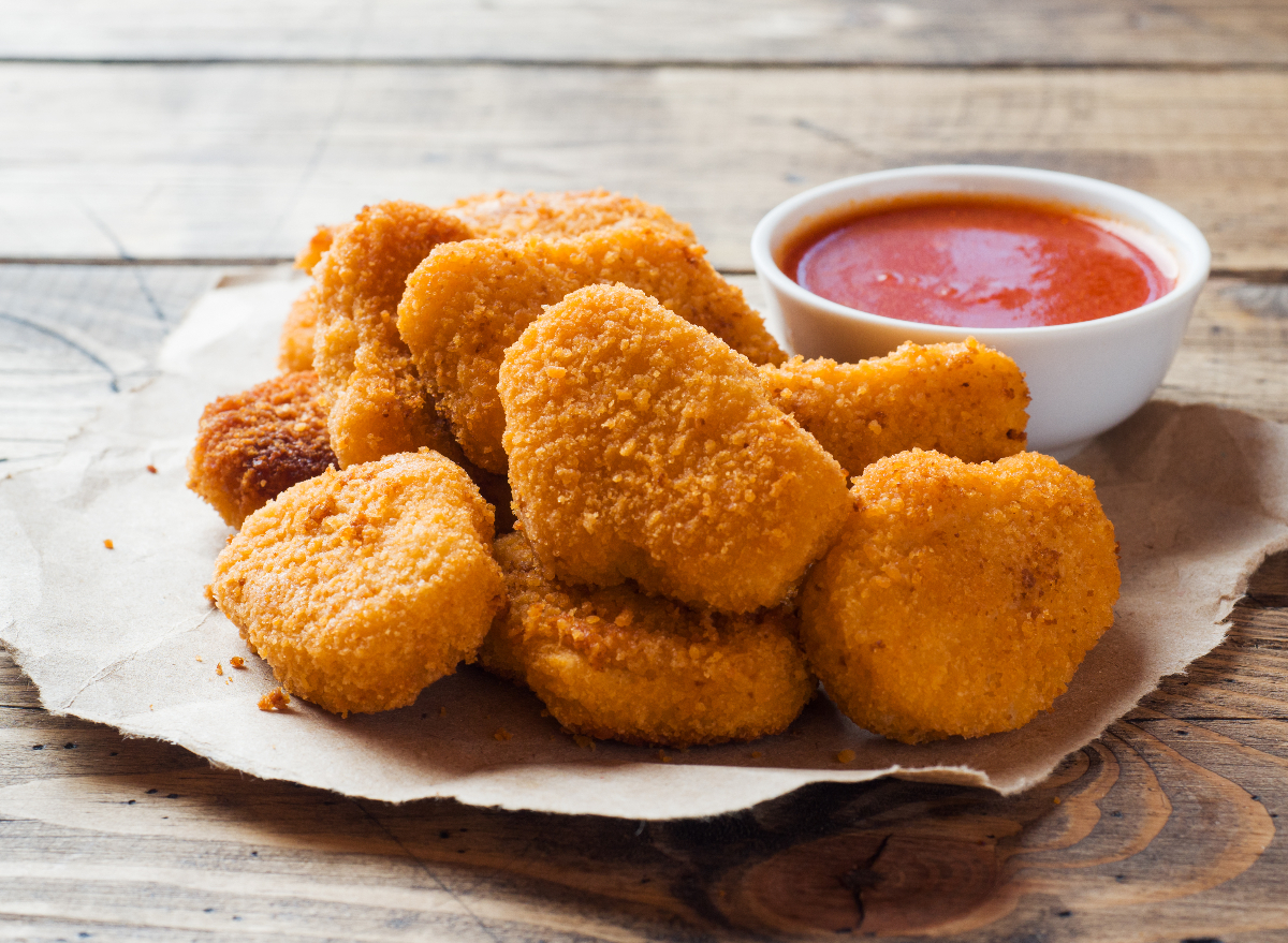 chicken nuggets with ketchup, concept of the worst frozen foods that can make you gain weight