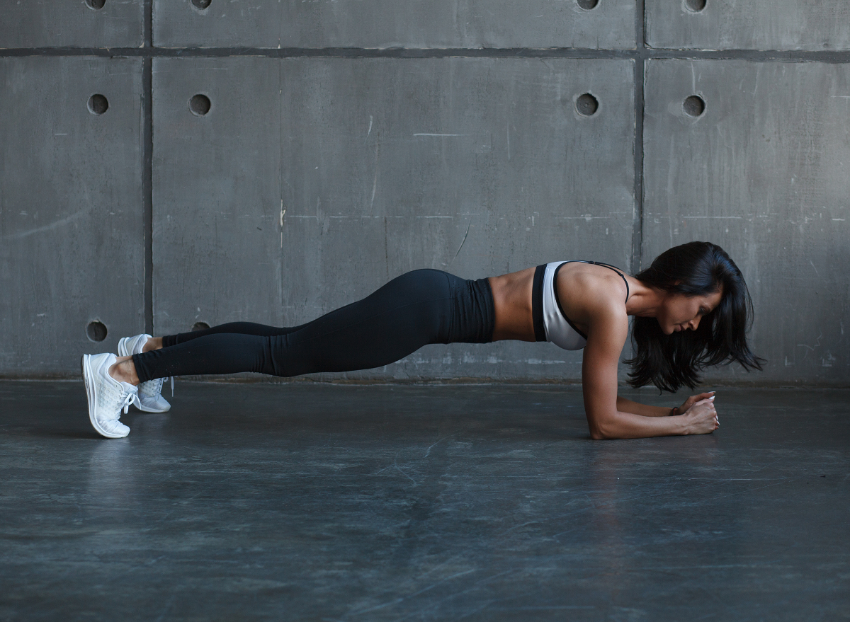 fit woman doing planks, ab exercises for women