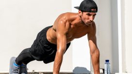 fit muscular man doing pushups, high plank position, concept of daily floor exercises for men to stay fit