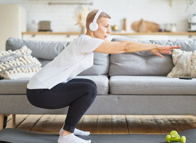 mature woman doing bodyweight squats