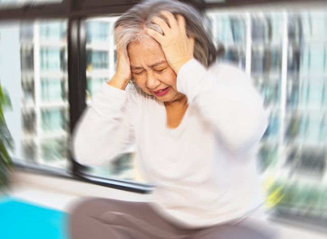 mature woman feeling dizzy