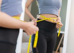 measuring waist, weight loss concept of how to lose five pounds quickly