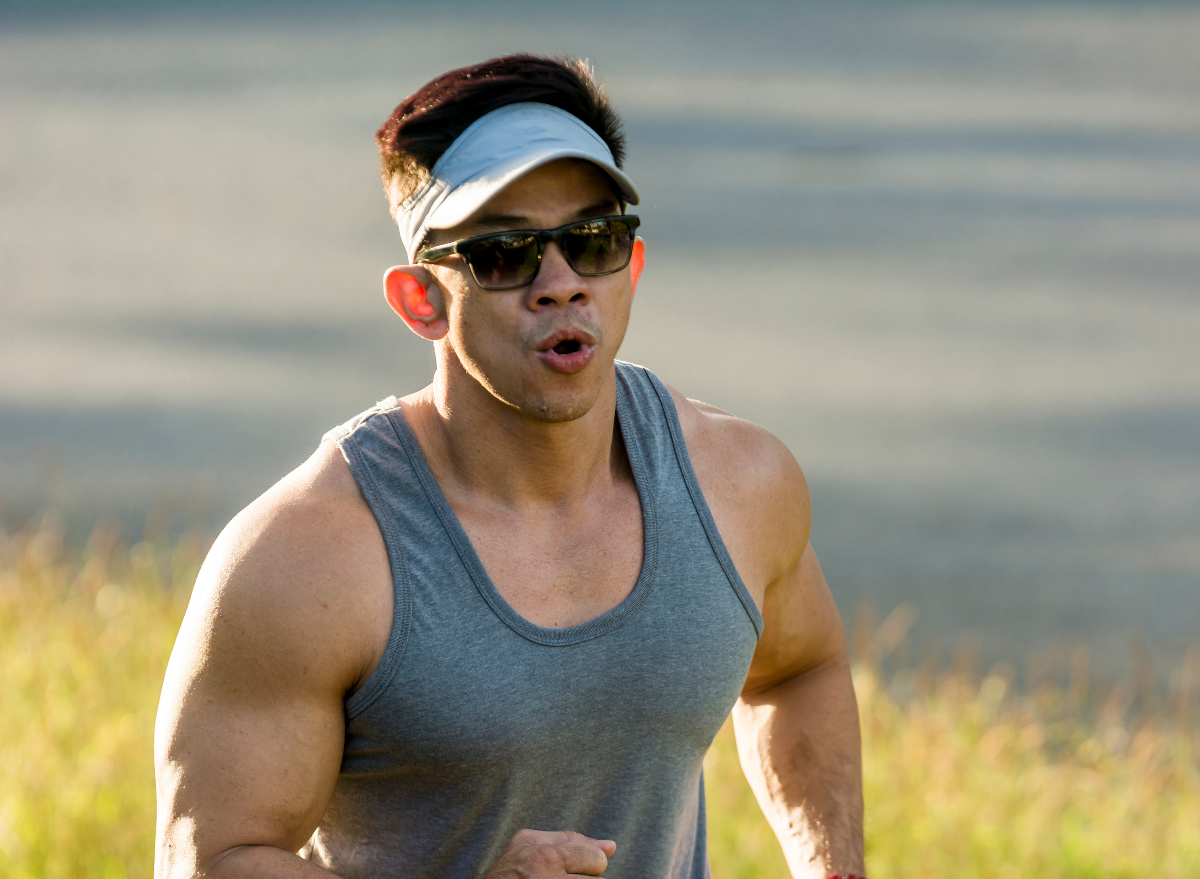 middle-aged man running outdoors, concept of daily habits to increase stamina after 40